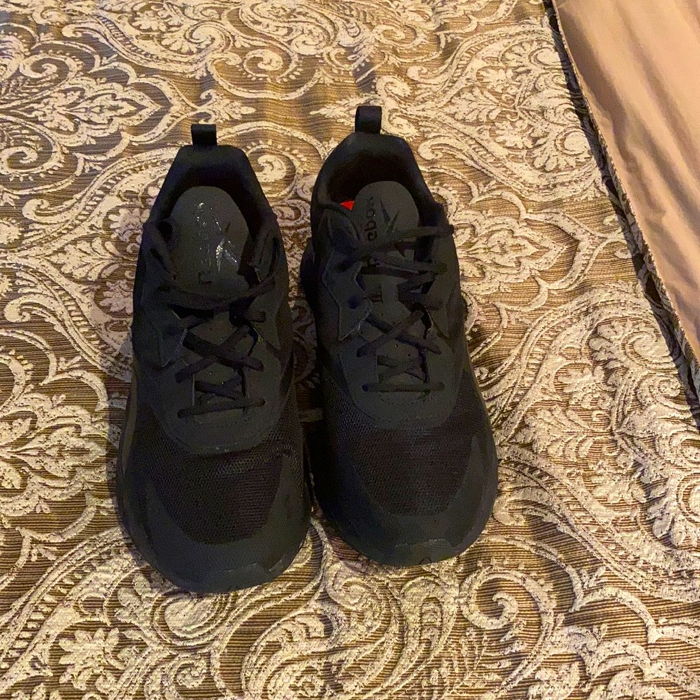 Reebok zig tennis shoes.
